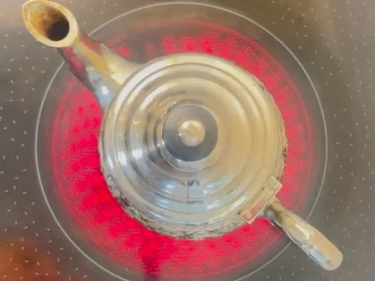 Moroccan tea kettle on the stove.