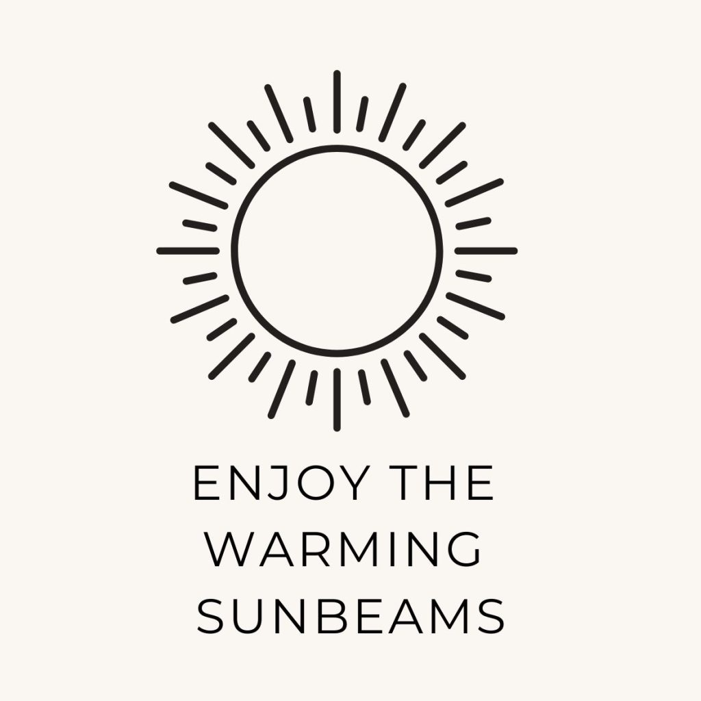 A sun with beams and the fift March bucket list task: "Enjoy the warming sunbeams".