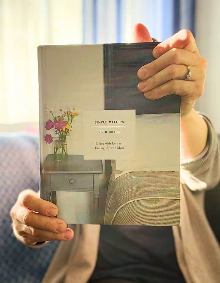 Woman holdingg a book called Simple Matters by Erin Boyle.